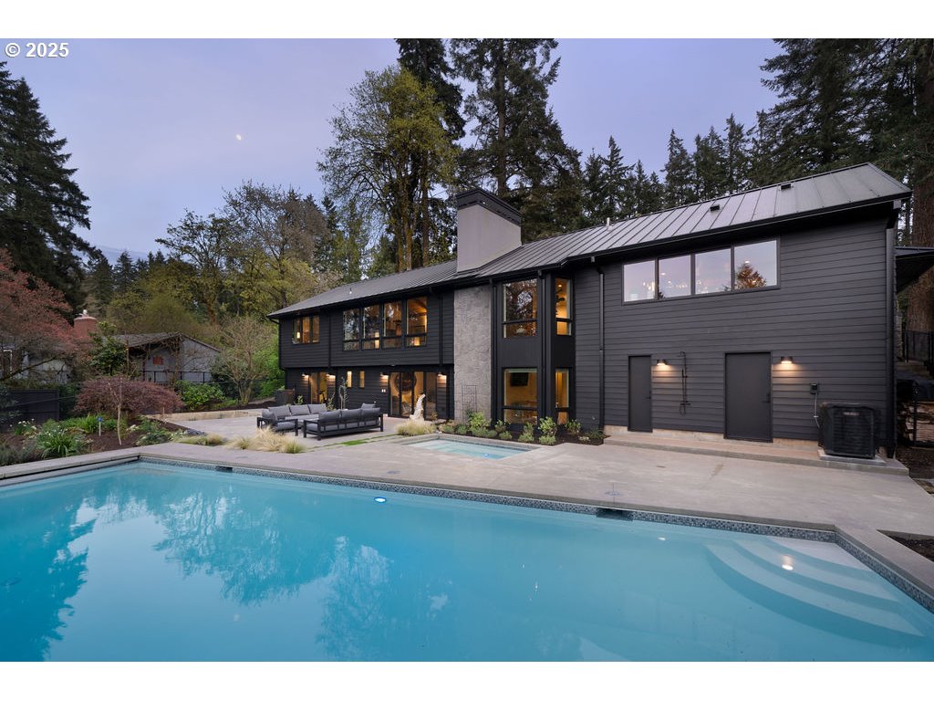 2627 Park Road Lake Oswego, OR 97034 - Photo 44 of 47 a front view of a house with dining space and garden