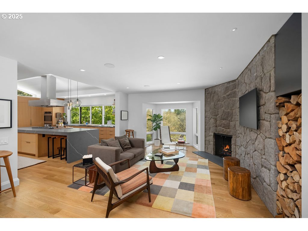 2627 Park Road Lake Oswego, OR 97034 - Photo 9 of 47 a living room with fireplace furniture and a fireplace