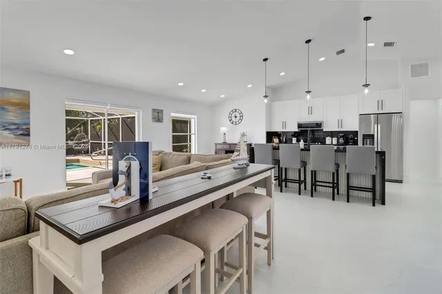 a view of a dining room with furniture