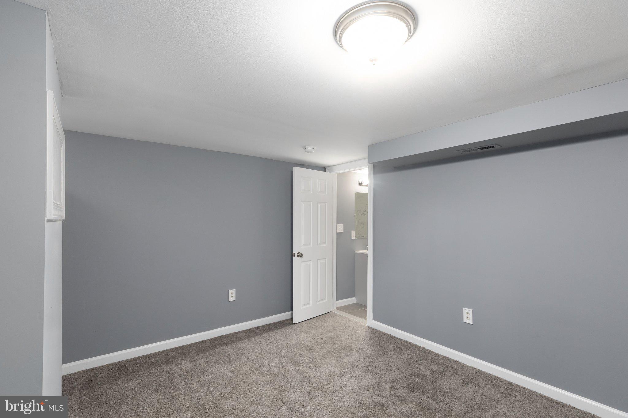 8305 Kavanagh Road Dundalk, MD 21222 - Photo 15 of 20 Lower Level Bedroom