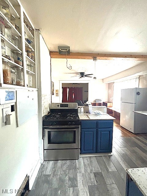 805 Rudyard Road Cleveland, OH 44110 - Photo 8 of 45 Kitchen with stainless steel gas stove, freestanding refrigerator, blue cabinets, dark wood-style flooring, and ceiling fan