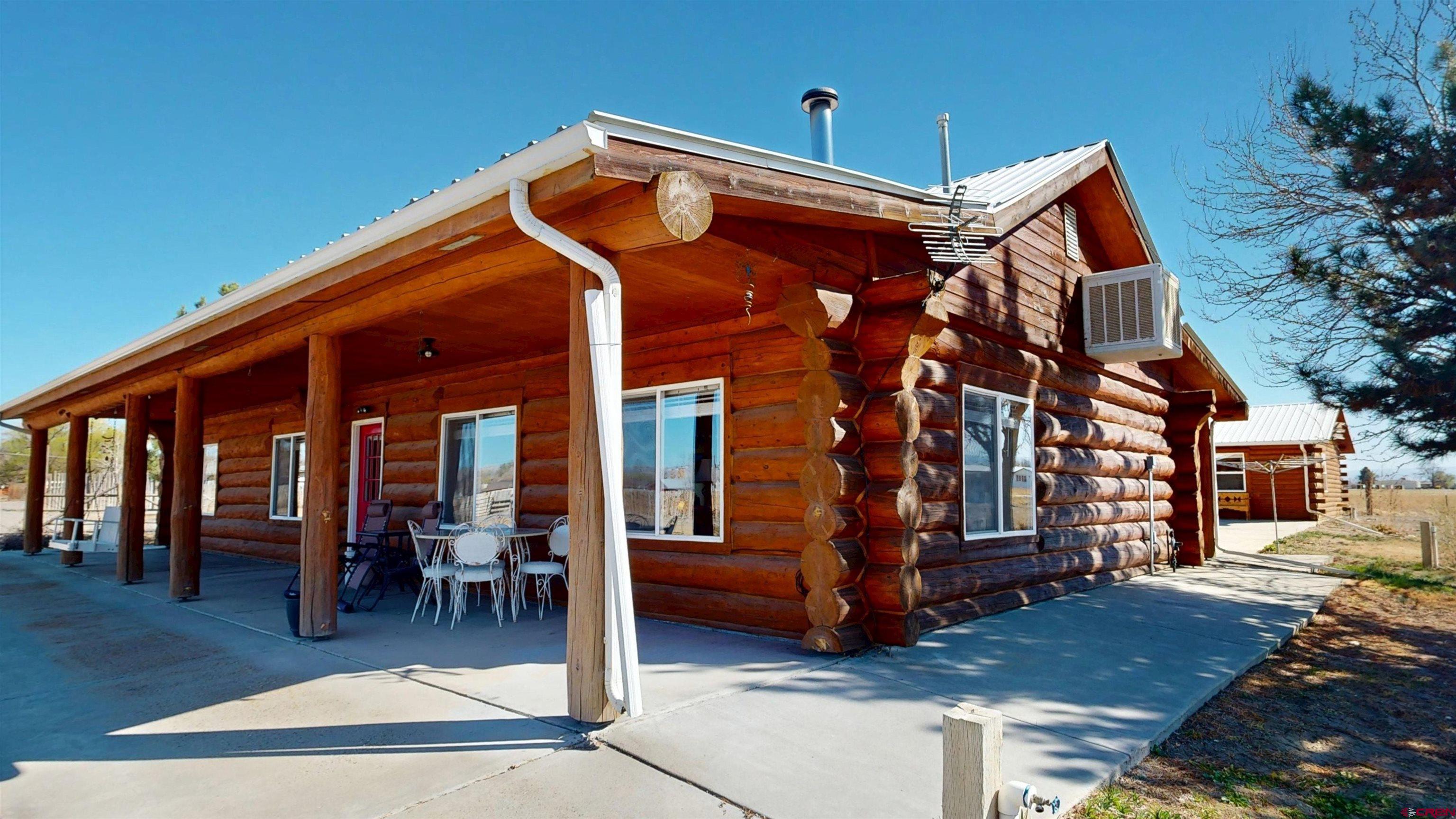 2083 Pioneer Road Delta, CO 81416 - Photo 1 of 43 a view of a house with a outdoor space
