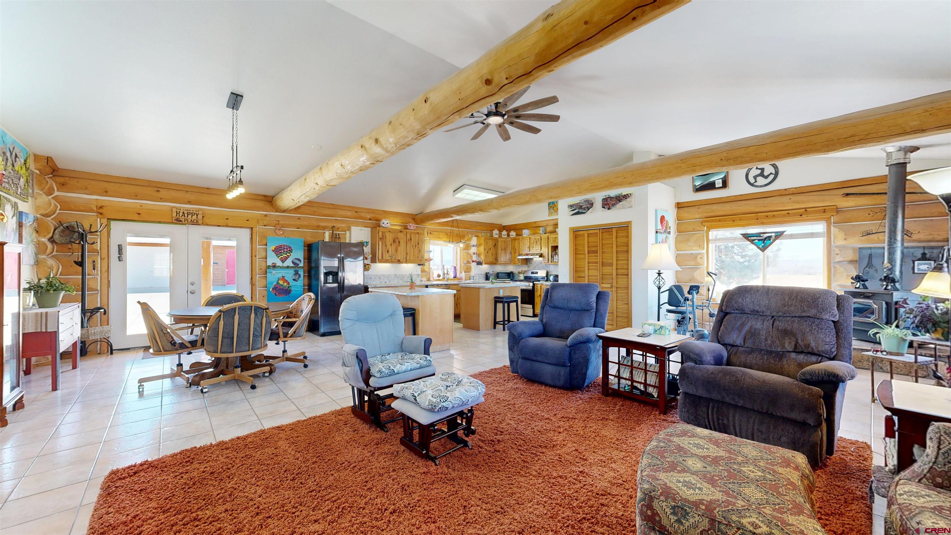 2083 Pioneer Road Delta, CO 81416 - Photo 11 of 43 a living room with furniture kitchen view and a large window