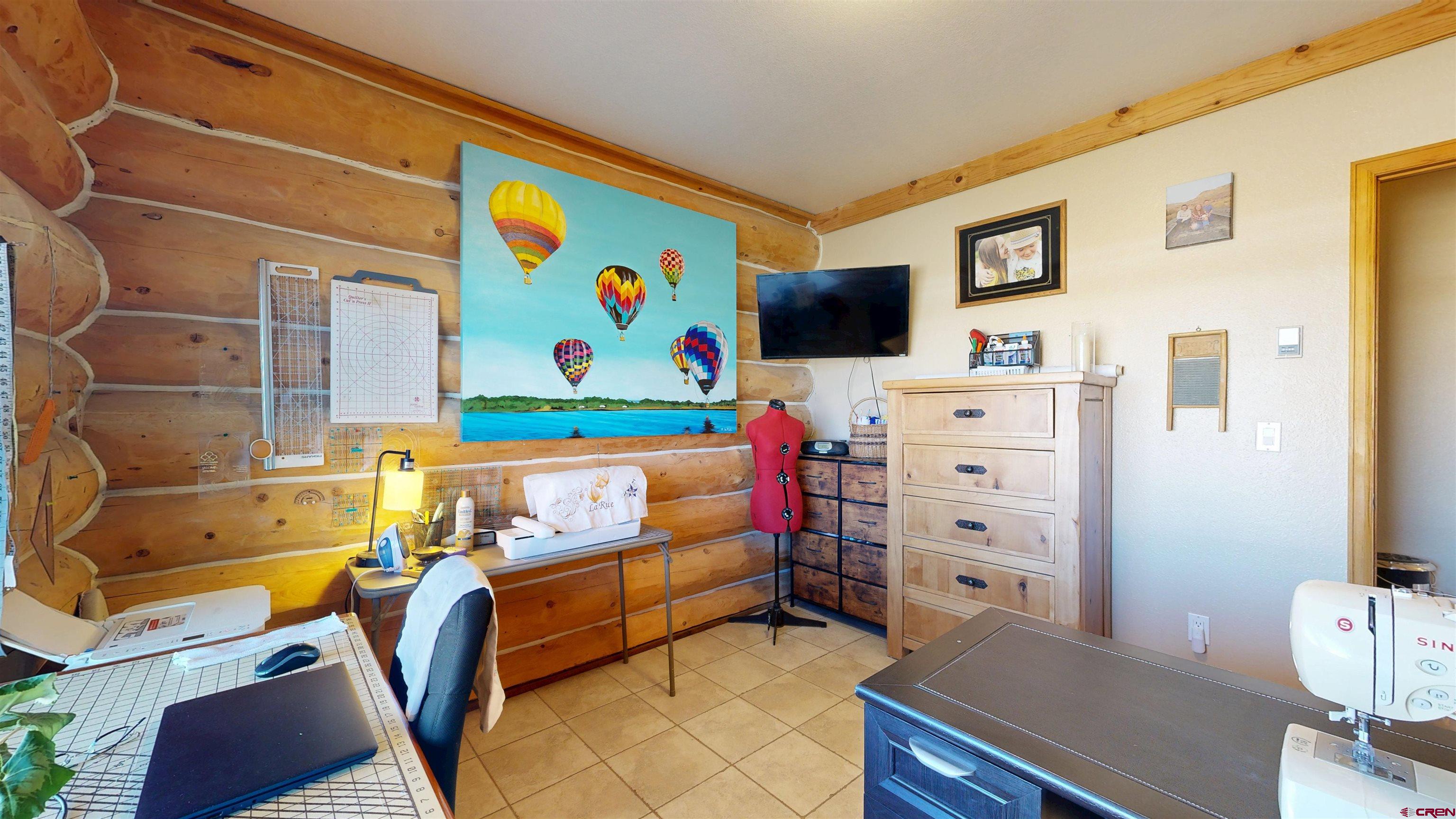 2083 Pioneer Road Delta, CO 81416 - Photo 20 of 43 a bedroom with furniture and a bed