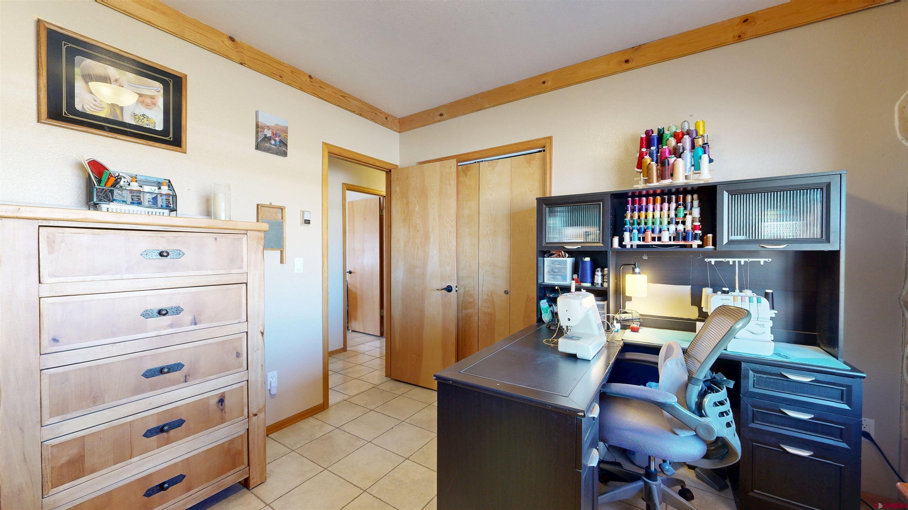 2083 Pioneer Road Delta, CO 81416 - Photo 22 of 43 a view of a workspace with furniture