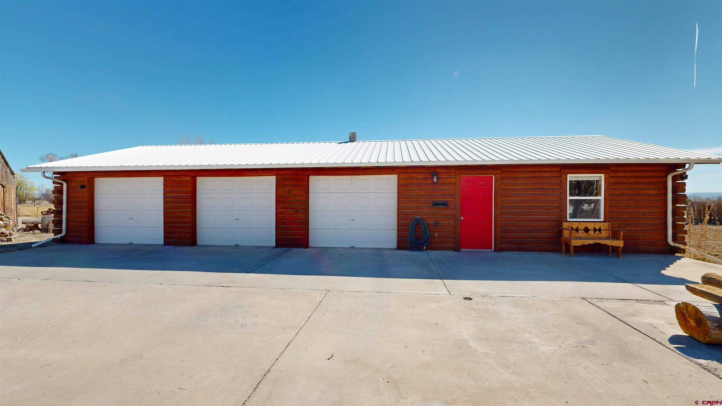 2083 Pioneer Road Delta, CO 81416 - Photo 30 of 43 front view of a house with a garage