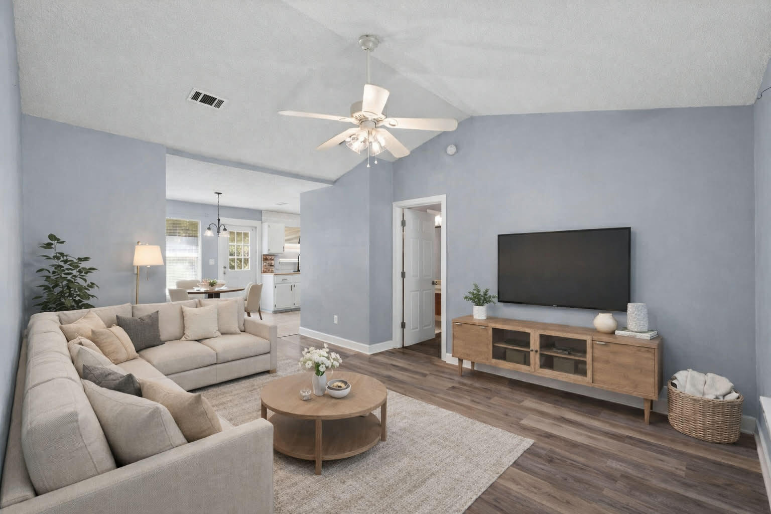 2517 Sunset Drive Crestview, FL 32536 - Photo 4 of 34 a living room with furniture and a flat screen tv