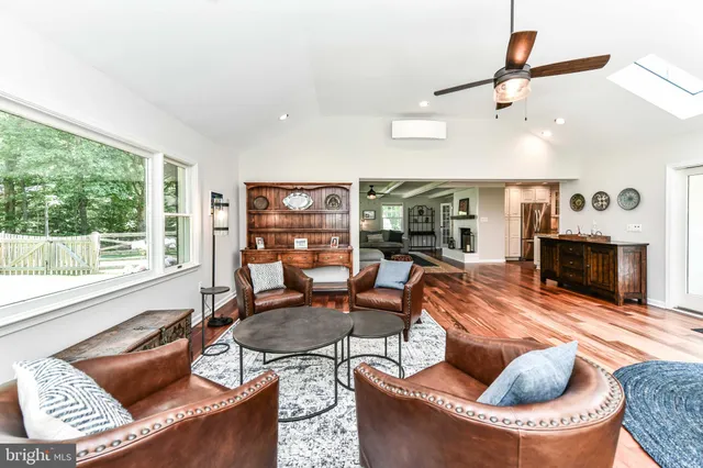 a kitchen with granite countertop a stove sink and cabinets