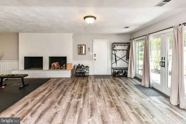 a bed room with a bed and a book shelf