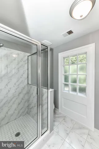 a view of a chairs and table on the wooden floor