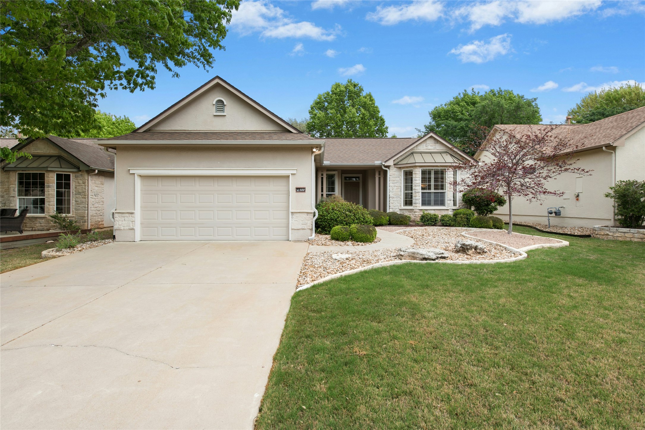 122 Harness Lane Georgetown, TX 78633 - Photo 39 of 40 Delightful curb with this Del Webb-built Dickinson floor plan home. Located with easy golf cart access to all THREE of Sun City’s premier 18-hole golf courses and multiple fitness and amenity centers!