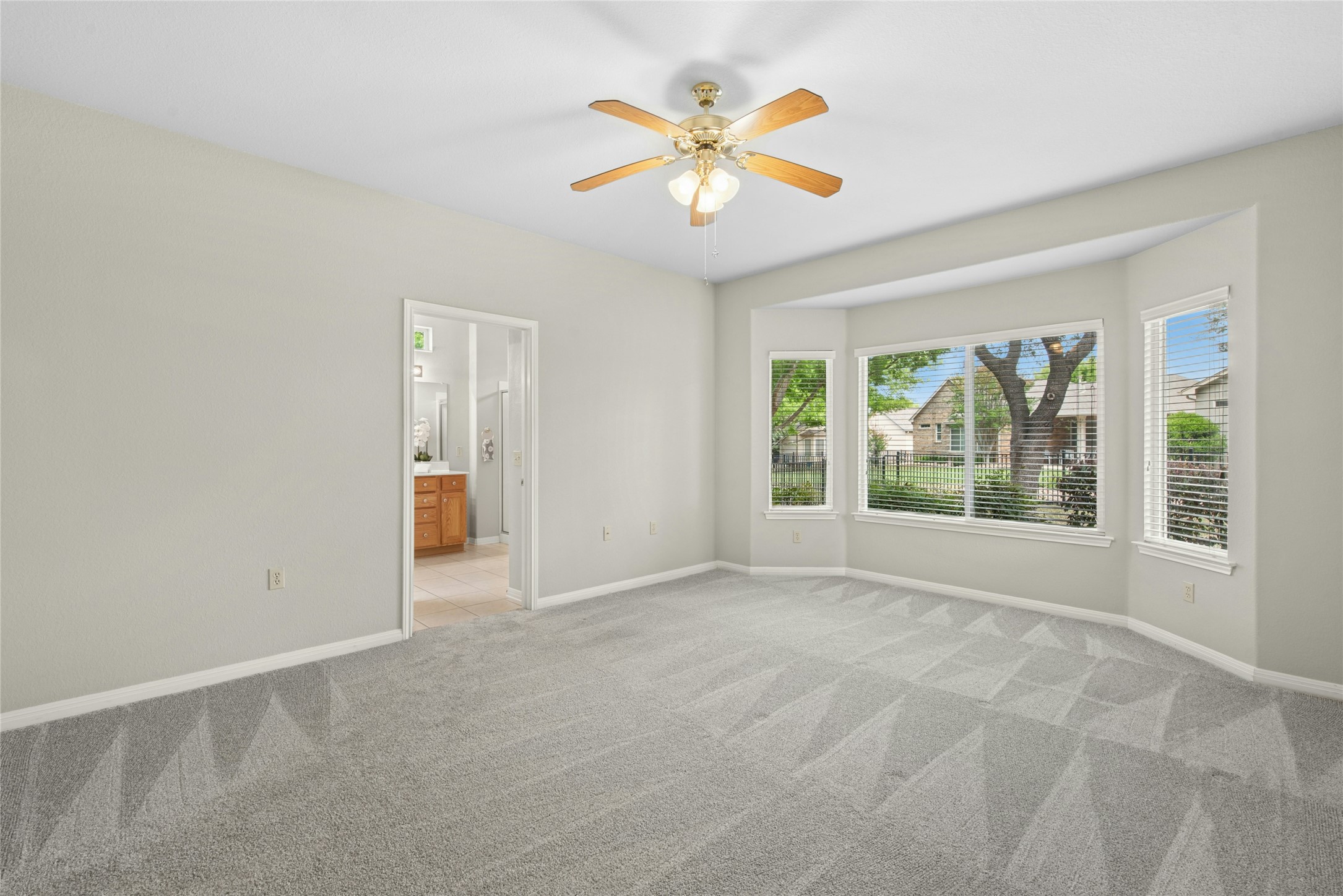 122 Harness Lane Georgetown, TX 78633 - Photo 18 of 40 a view of an empty room with a window