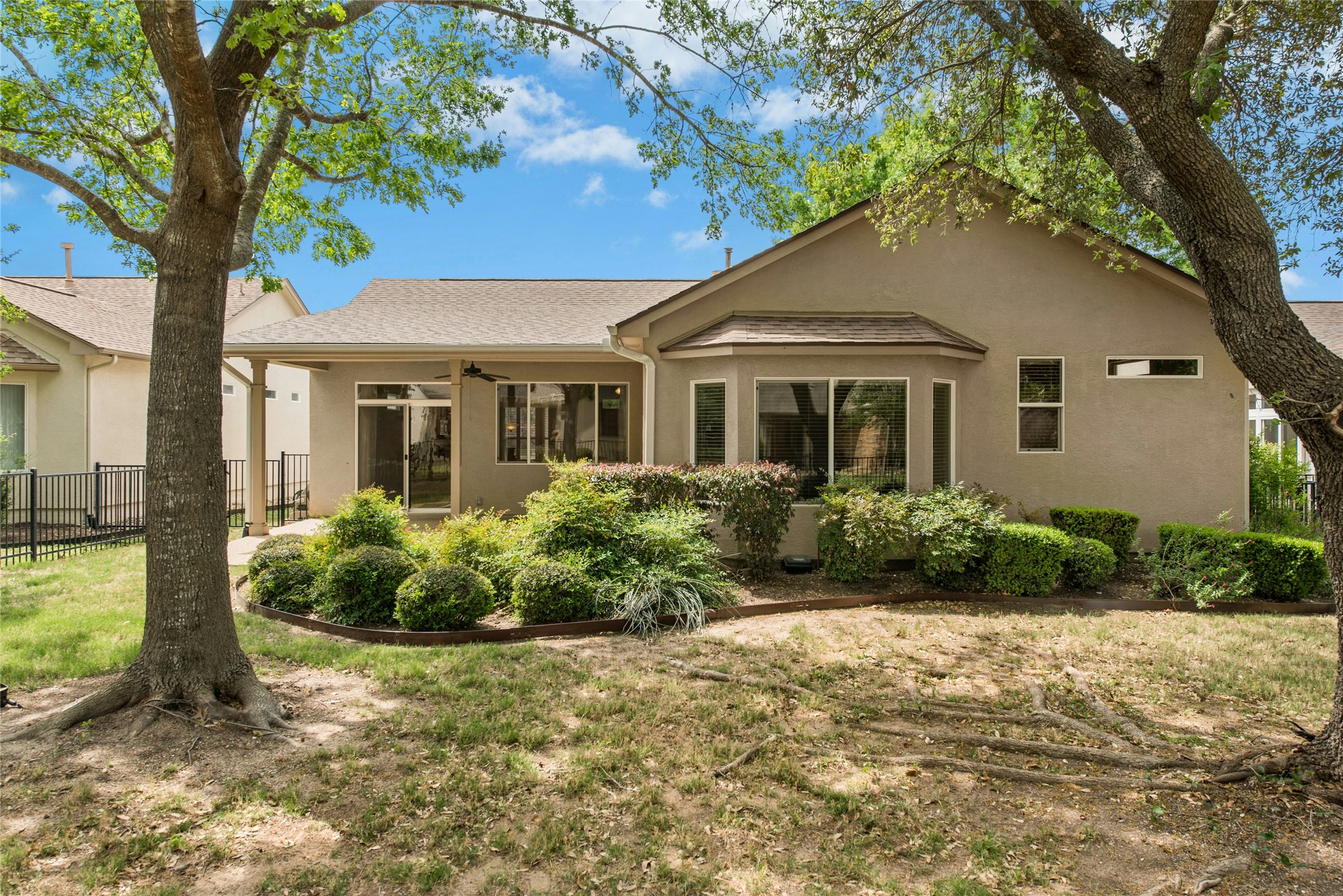 122 Harness Lane Georgetown, TX 78633 - Photo 31 of 40 a front view of a house with garden