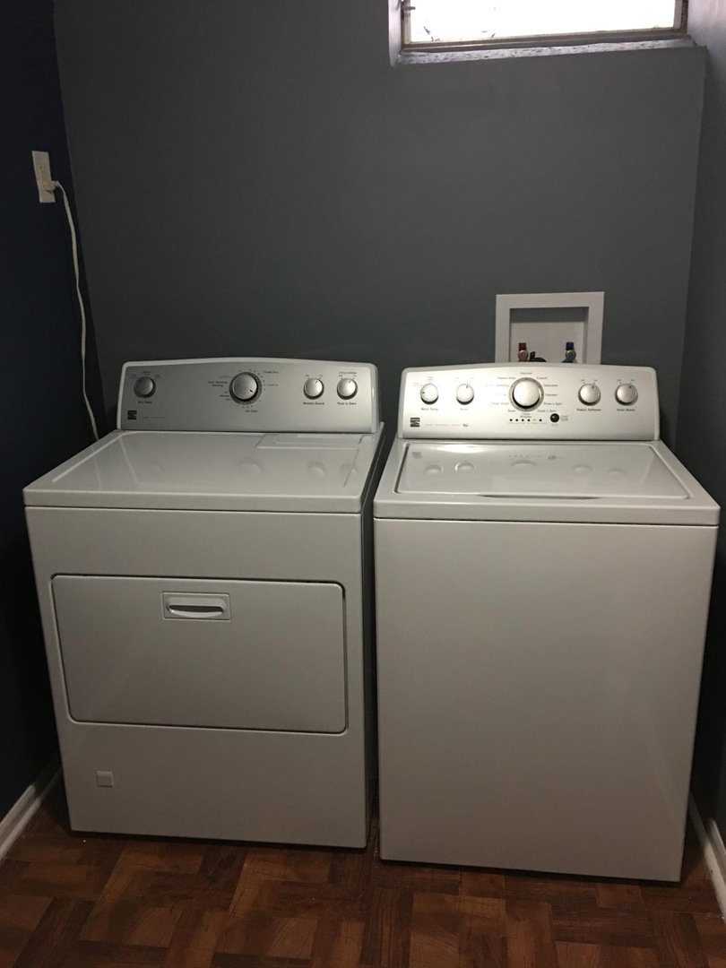 Undisclosed Address Bolingbrook, IL 60440 - Photo 13 of 15 a utility room with dryer and washer
