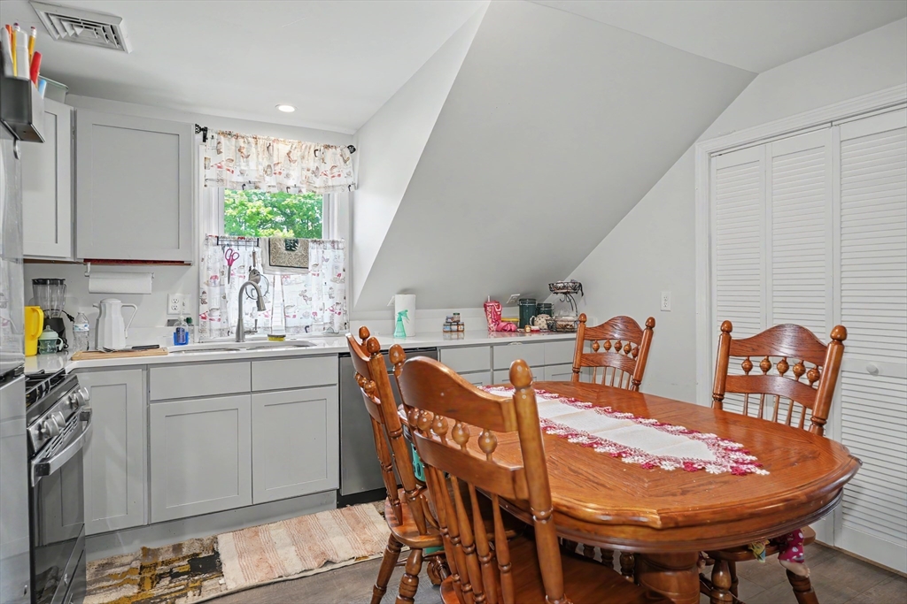 5 Eddy Street, Unit 2 Webster, MA 01570 - Photo 11 of 18 a view of a dining room with furniture