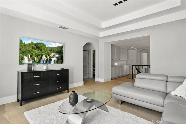 a spacious bathroom with a bathtub and shower