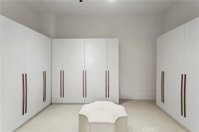 a view of a roof deck with wooden floor and fence