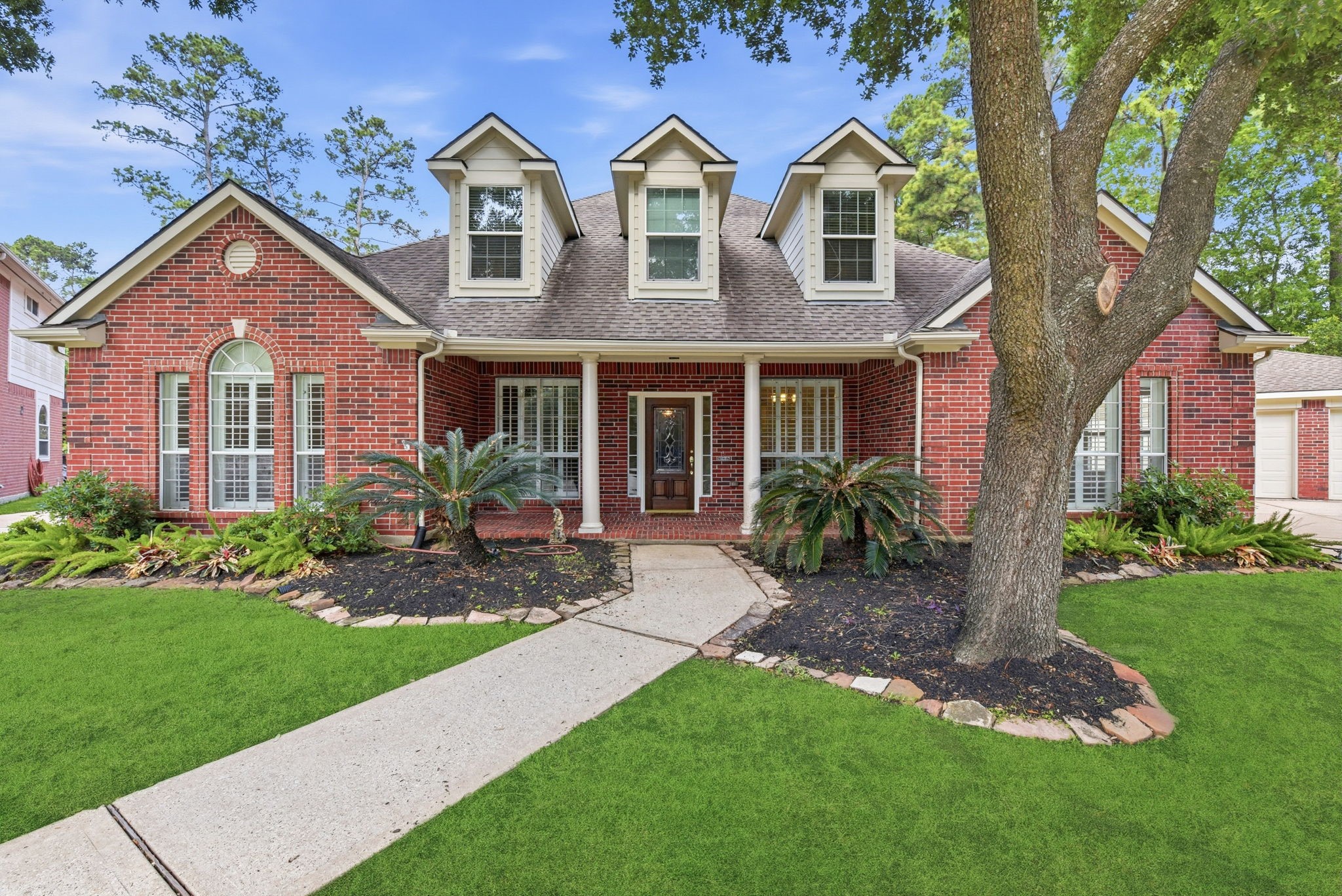 Welcome home to 3414 Hackberry Court in the sought after neighborhood of Cypresswood Glen!