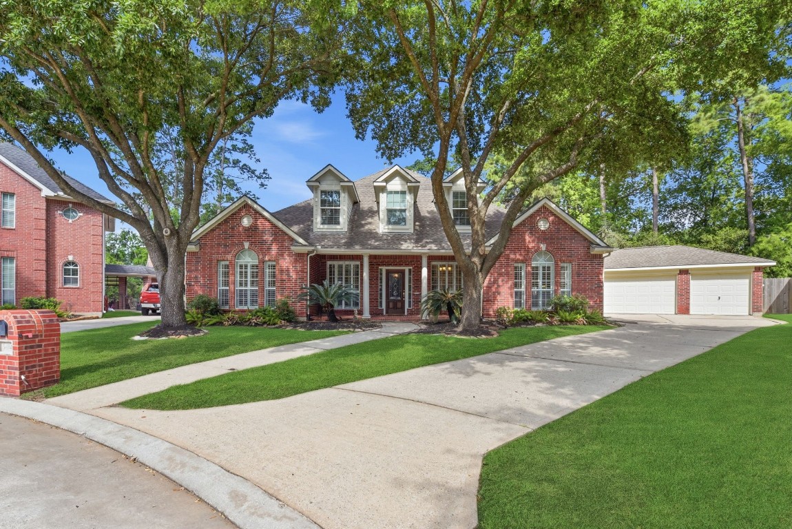 3414 Hackberry Court Spring, TX 77388 - Photo 2 of 50 This two story brick home is nestled on a quiet cul de sac and has a three car garage!