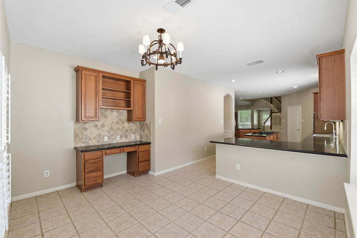 3414 Hackberry Court Spring, TX 77388 - Photo 21 of 50 This large breakfast room also has a built in desk area!