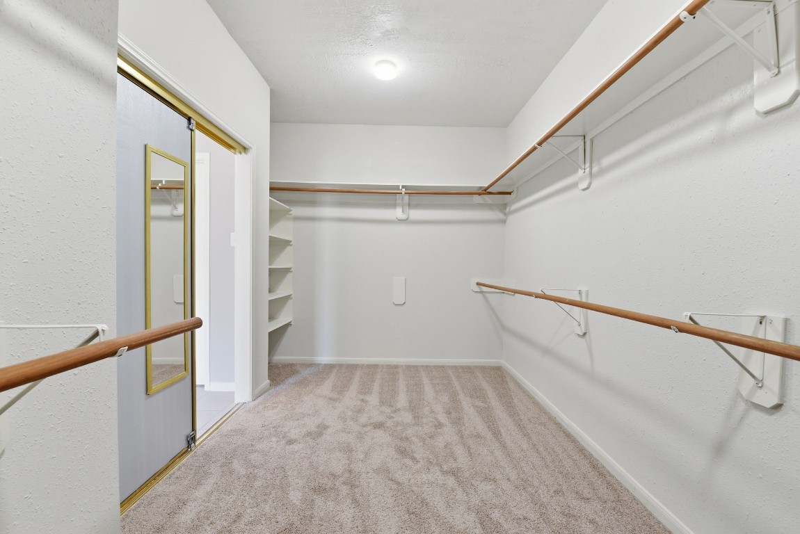 3414 Hackberry Court Spring, TX 77388 - Photo 28 of 50 Look at this huge walk in closet in the primary! You'll finally have a space for everything!