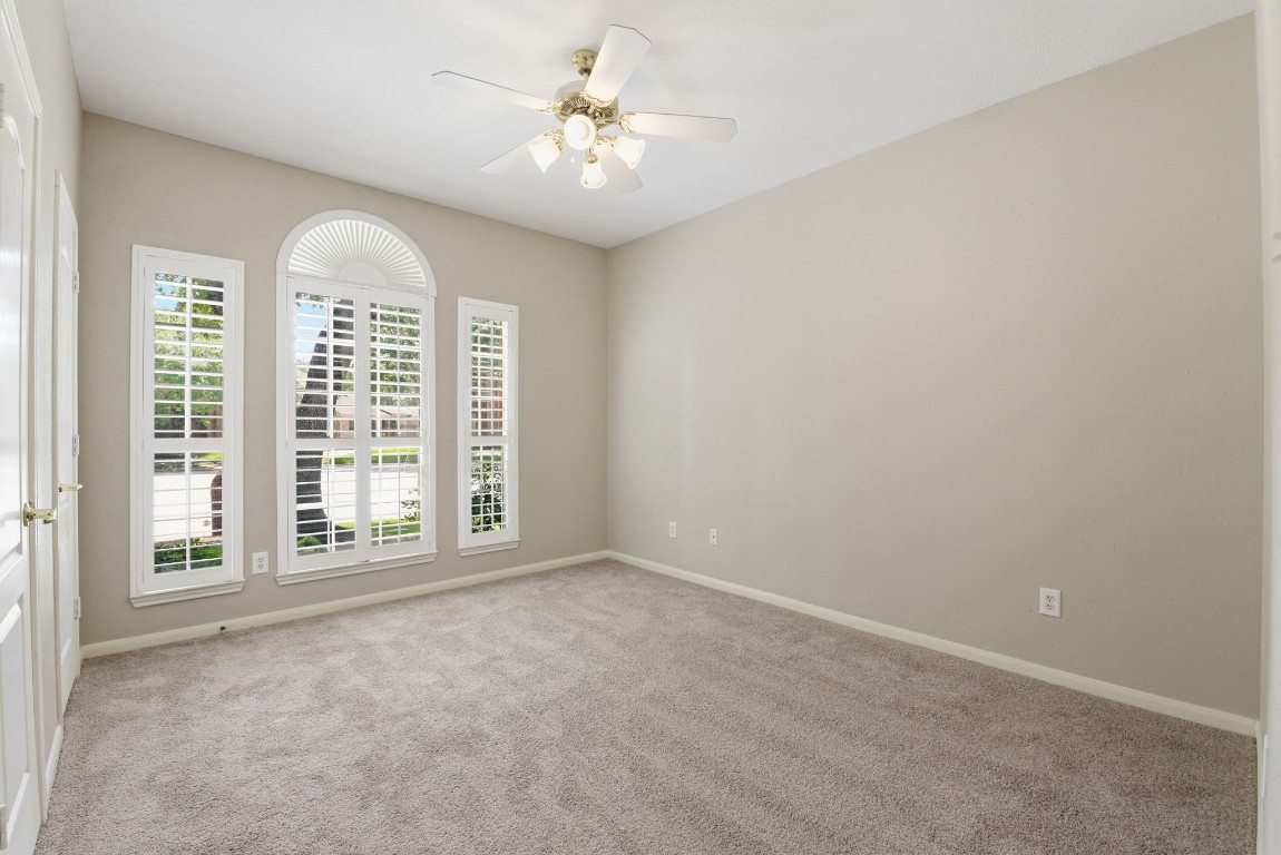 3414 Hackberry Court Spring, TX 77388 - Photo 29 of 50 This secondary bedroom is DOWNSTAIRS! What a bonus to have a second bedroom on the first floor- especially with its own full bath too!