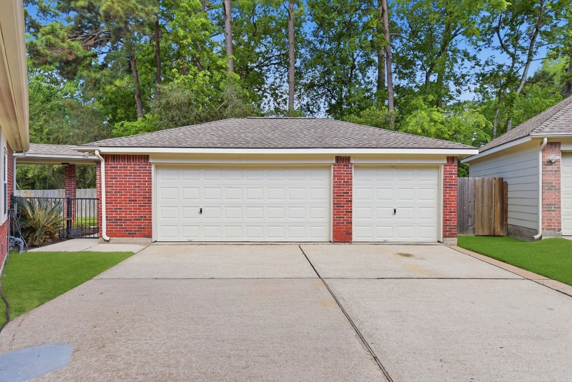 3414 Hackberry Court Spring, TX 77388 - Photo 3 of 50 This THREE CAR GARAGE is unattached and will give you so much parking and storage space!