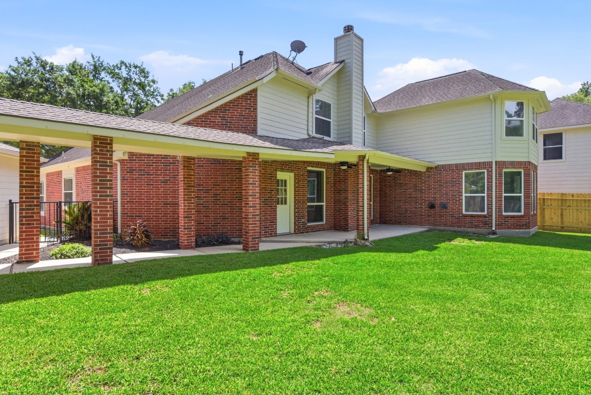 3414 Hackberry Court Spring, TX 77388 - Photo 49 of 50 The covered porch and covered walkway to the detached garage and driveway will be wonderful on rainy days!
