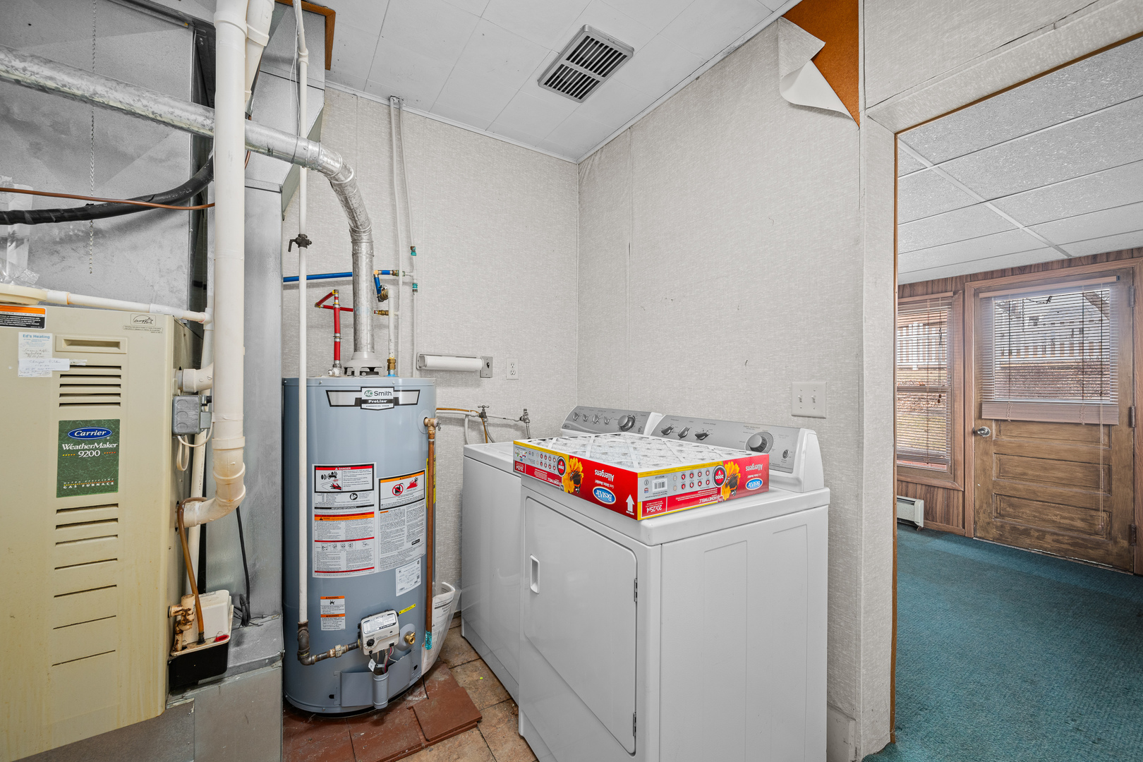 124 East Mill Street Kewanee, IL 61443 - Photo 13 of 21 a utility room with dryer and washer