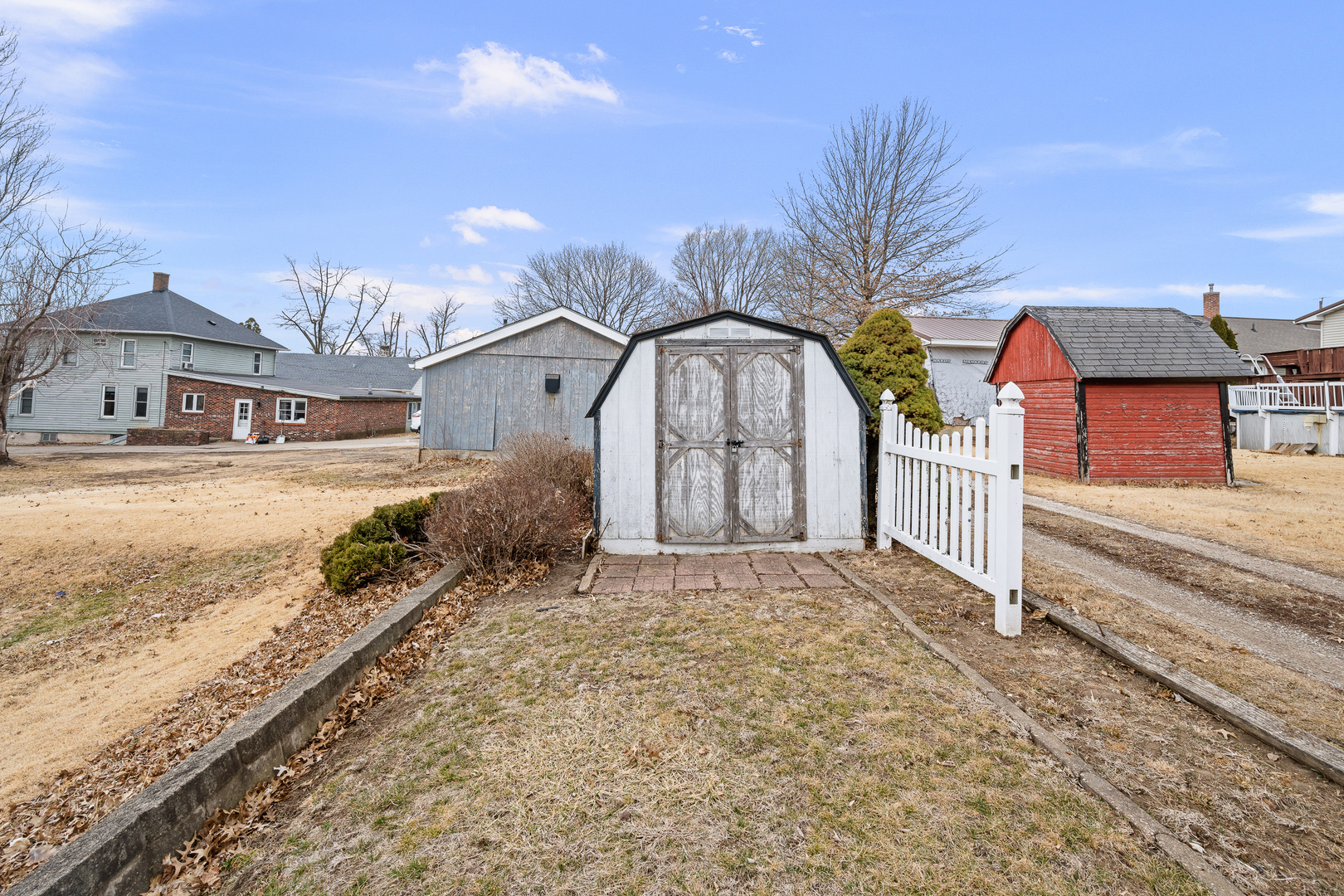 124 East Mill Street Kewanee, IL 61443 - Photo 20 of 21 a front view of a house with a yard