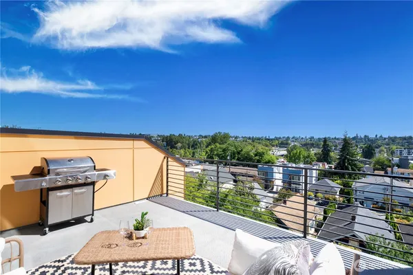 a view of a balcony with city view