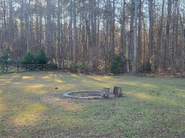 5012 Suwanee Dam Road Suwanee, GA 30024 - Photo 12 of 13 a view of outdoor space with deck and yard