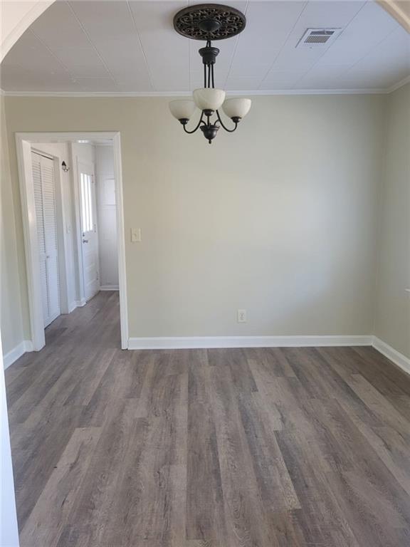 5012 Suwanee Dam Road Suwanee, GA 30024 - Photo 7 of 13 a view of a room with wooden floor and carpet