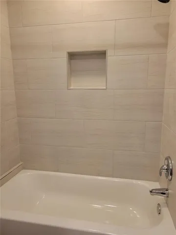 a bathroom with a bathtub