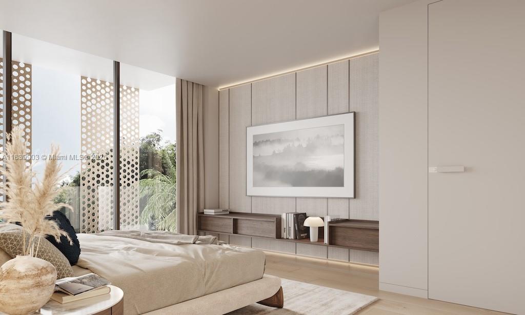 1709 Jefferson Avenue, Unit TH08 Miami Beach, FL 33139 - Photo 11 of 16 a living room with furniture and a large window