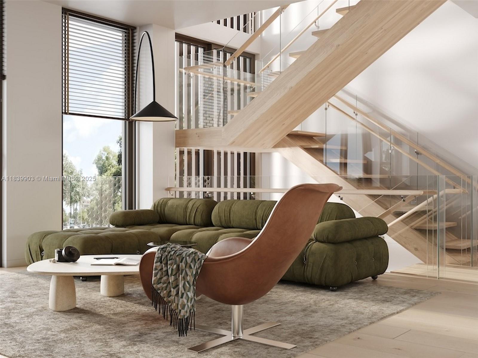 1709 Jefferson Avenue, Unit TH08 Miami Beach, FL 33139 - Photo 5 of 16 a living room with furniture and a large window