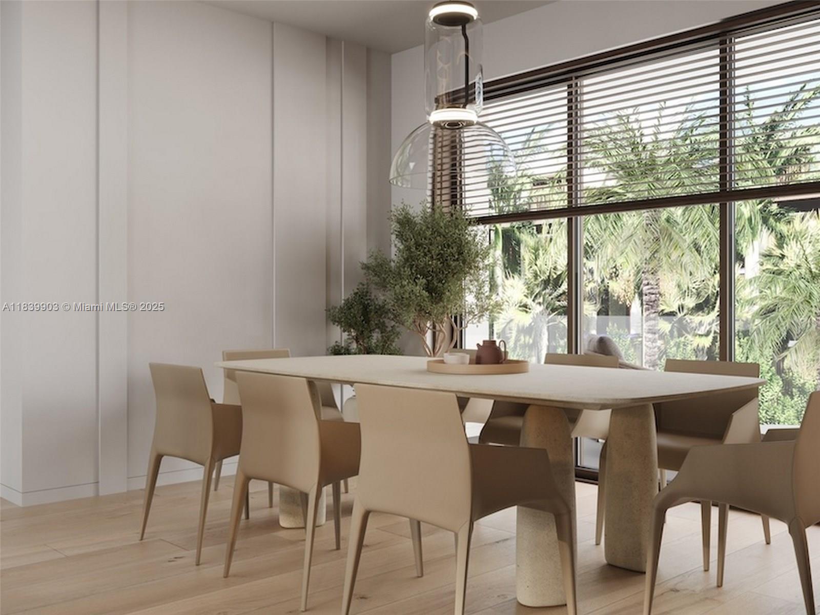 1709 Jefferson Avenue, Unit TH08 Miami Beach, FL 33139 - Photo 6 of 16 a dining room with furniture and window