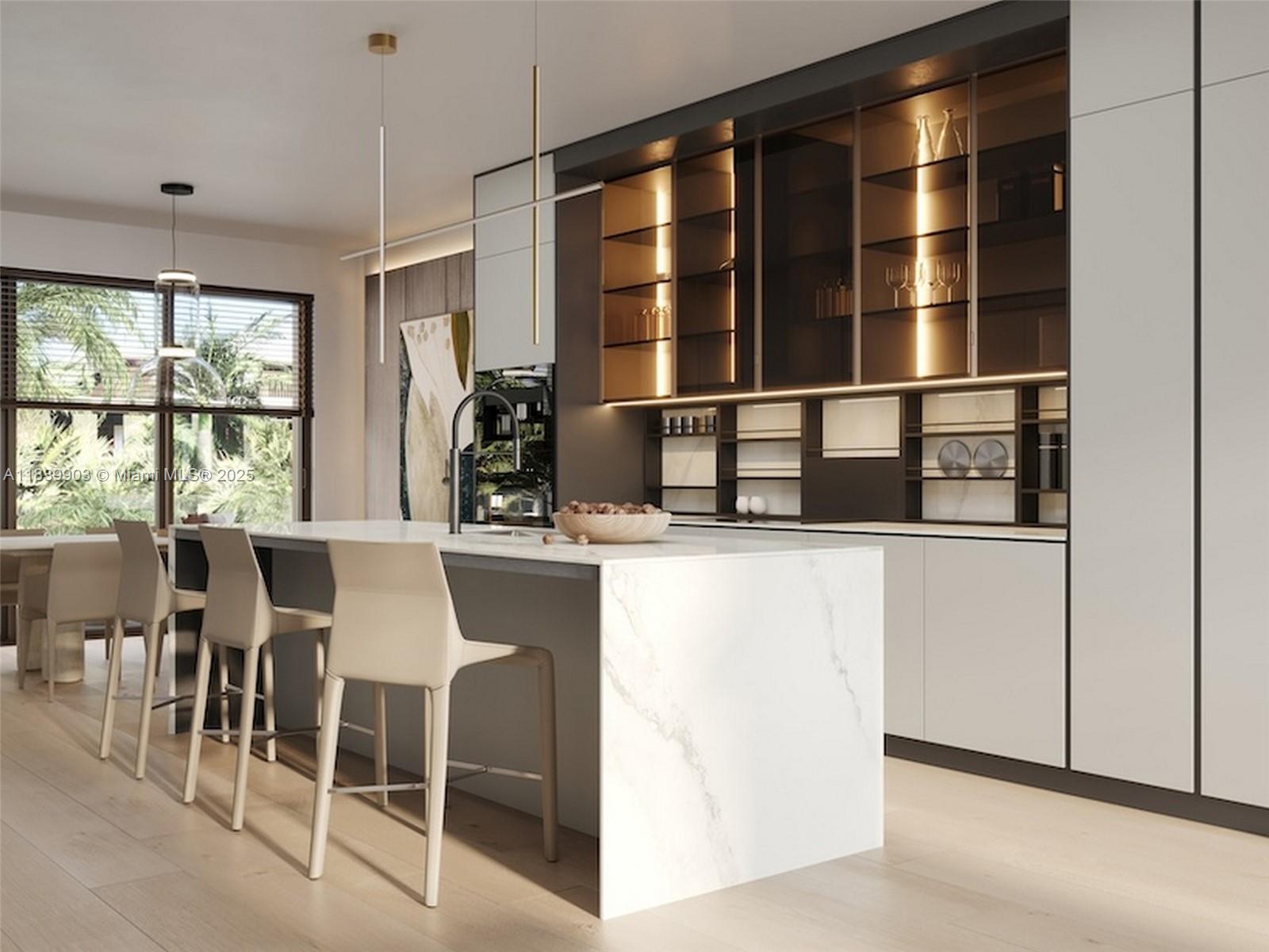 1709 Jefferson Avenue, Unit TH08 Miami Beach, FL 33139 - Photo 8 of 16 a kitchen with a dining table chairs and large window