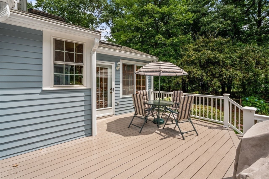 19 Brady Loop Andover, MA 01810 - Photo 30 of 35 a view of a house with wooden deck and furniture