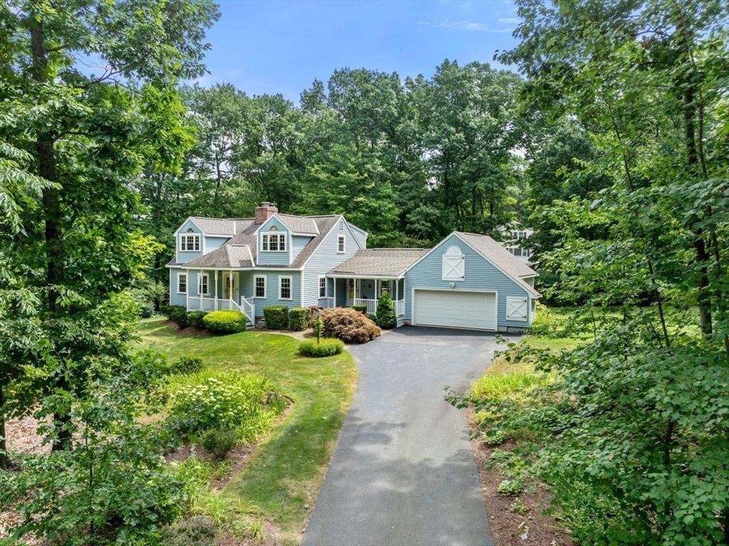 19 Brady Loop Andover, MA 01810 - Photo 3 of 35 a front view of a house with a garden