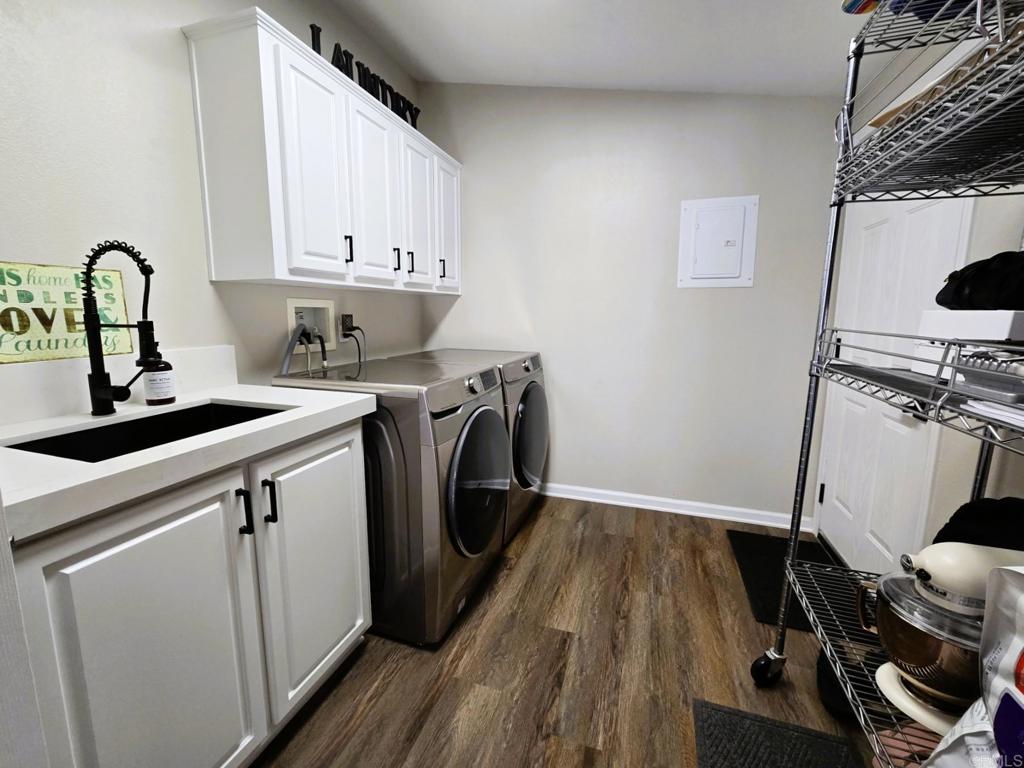 2239 Black Canyon Road, Unit 55 Ramona, CA 92065 - Photo 11 of 38 a view of a kitchen with sink and washing machine