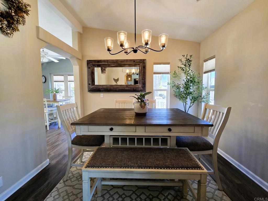 2239 Black Canyon Road, Unit 55 Ramona, CA 92065 - Photo 6 of 38 a view of a dining room with furniture and wooden floor