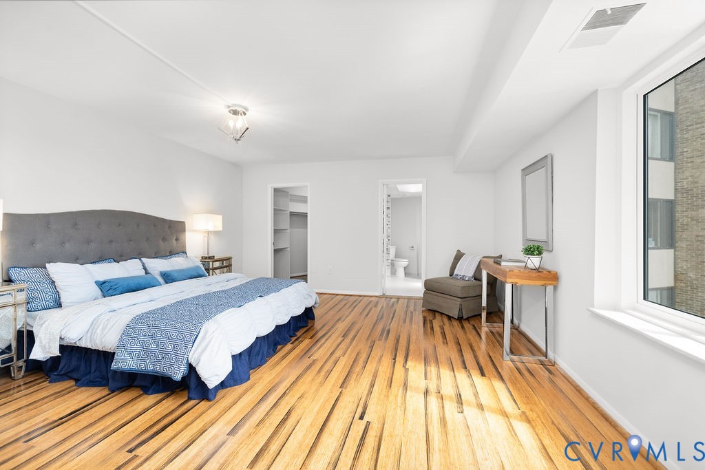 2956 Hathaway Road, Unit U704 Richmond, VA 23225 - Photo 24 of 42 Spacious bedroom featuring wood-finish flooring, a