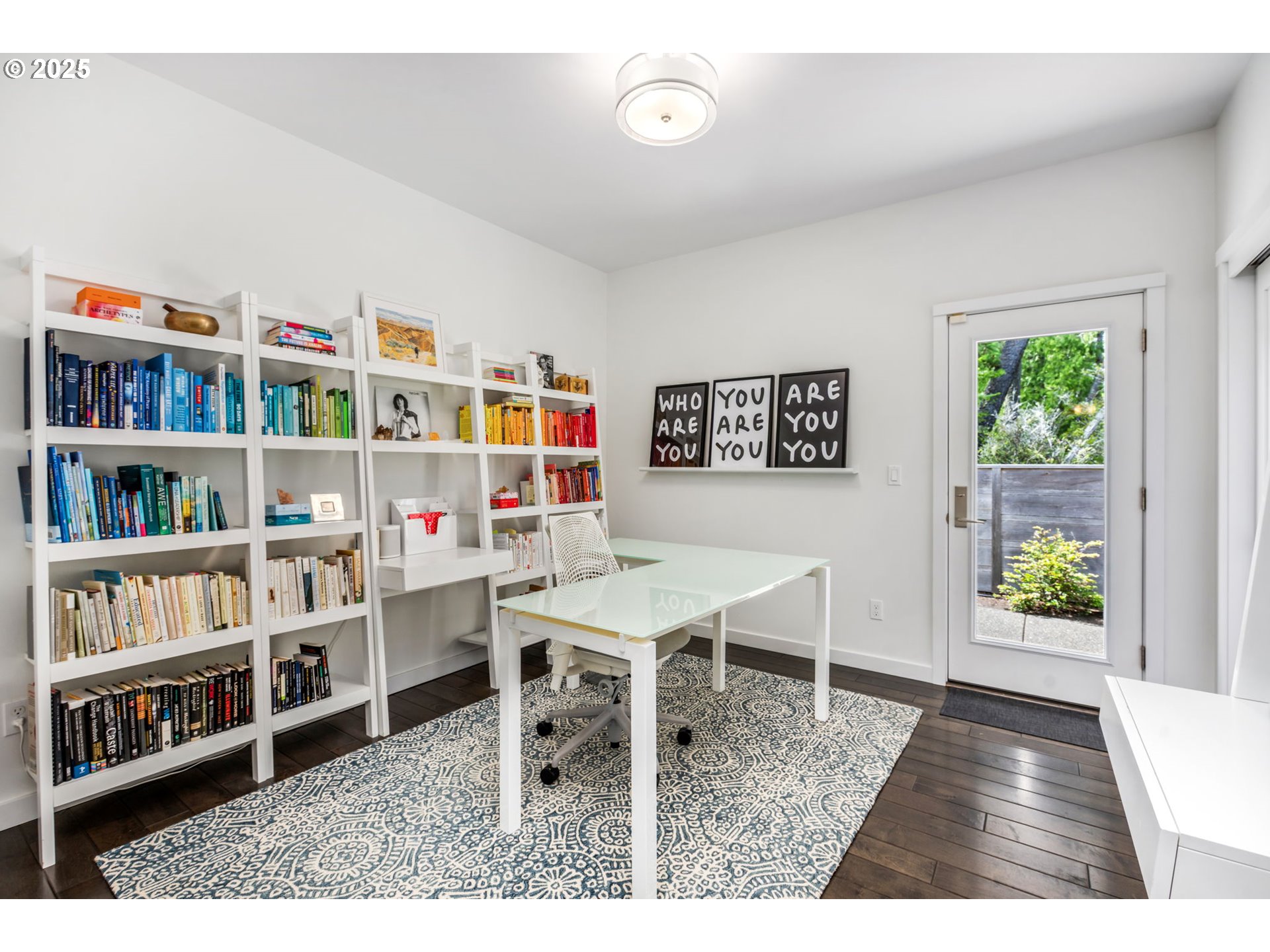 10190 Pine Ridge Drive Nehalem, OR 97131 - Photo 22 of 35 a workspace with furniture and a book shelf