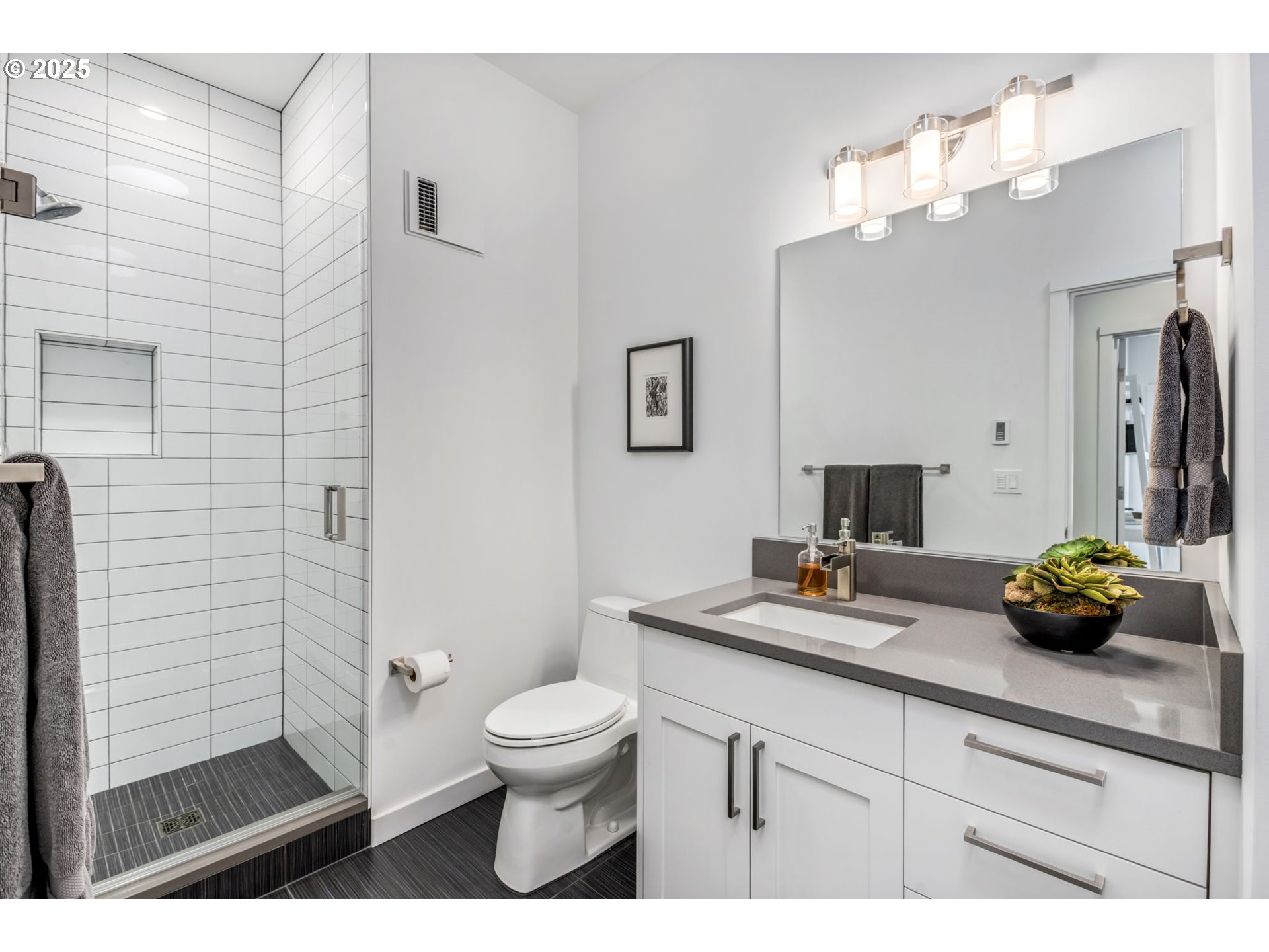 10190 Pine Ridge Drive Nehalem, OR 97131 - Photo 23 of 35 a bathroom with a sink a toilet and shower