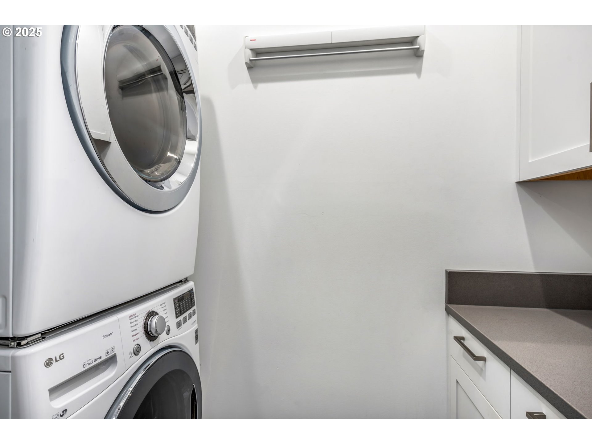 10190 Pine Ridge Drive Nehalem, OR 97131 - Photo 33 of 35 a utility room with dryer and washer