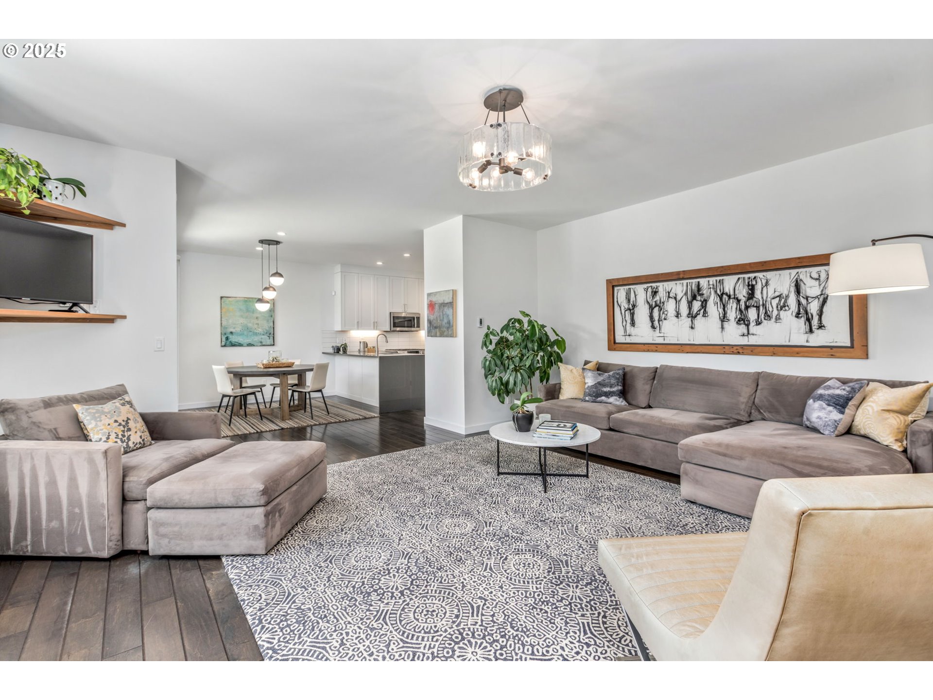 10190 Pine Ridge Drive Nehalem, OR 97131 - Photo 7 of 35 a living room with furniture and a chandelier