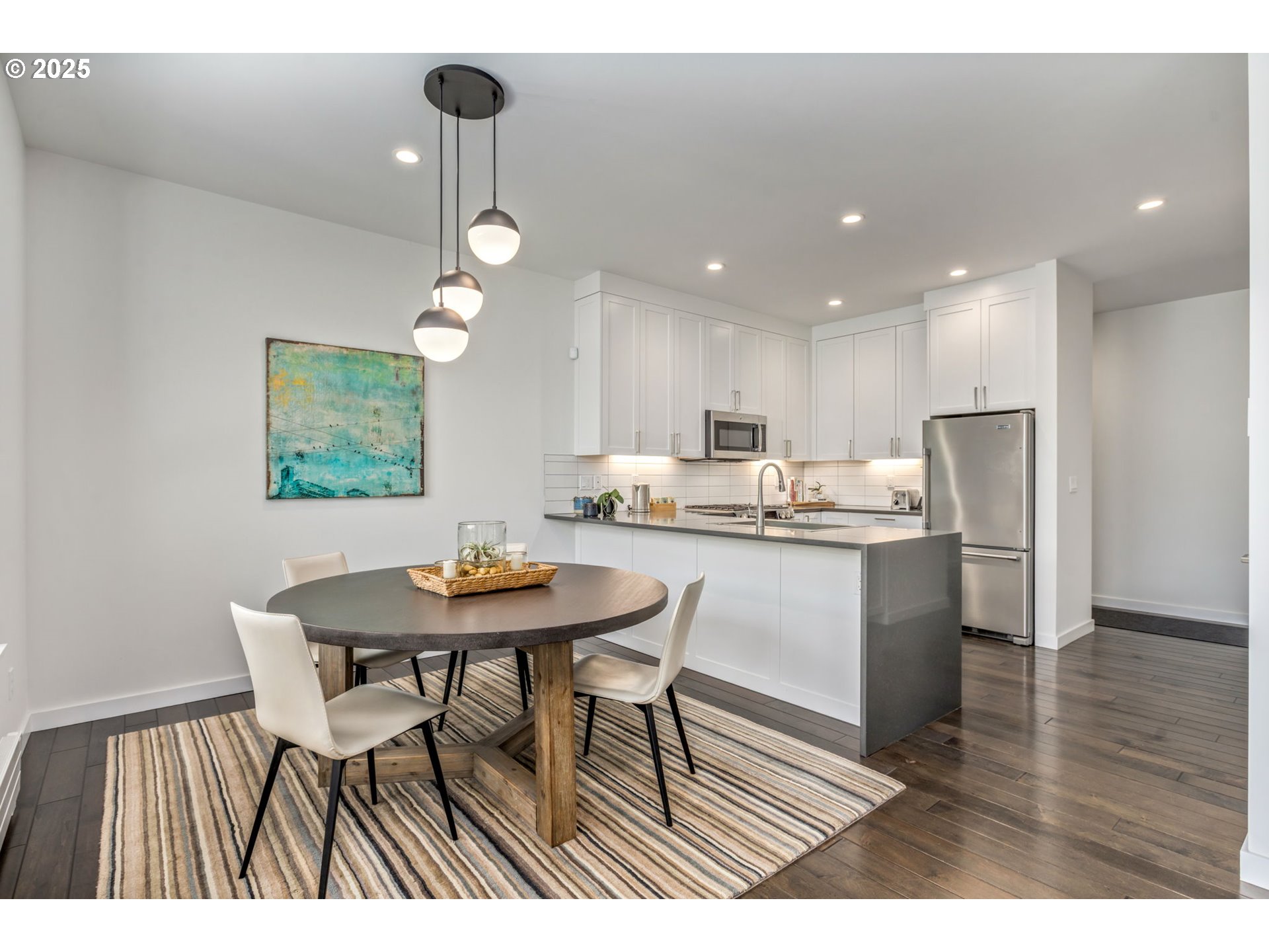 10190 Pine Ridge Drive Nehalem, OR 97131 - Photo 9 of 35 a kitchen with a table and chairs in it