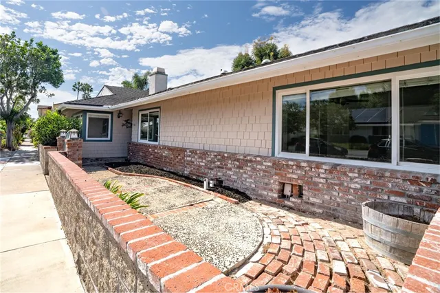 a house with swimming pool in front of it