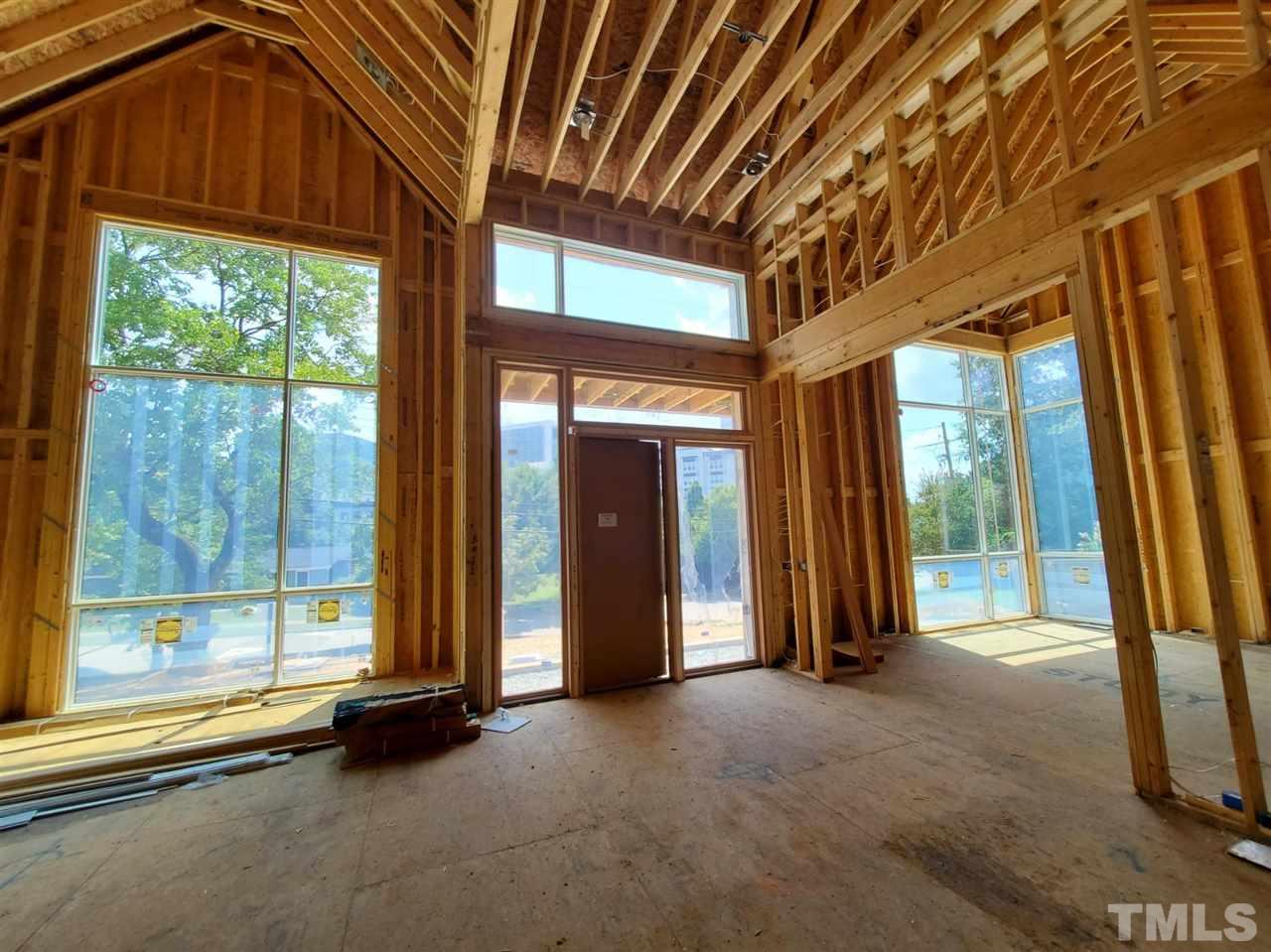 109 Dartmouth Road Raleigh, NC 27609 - Photo 12 of 24 a view of a room with large windows